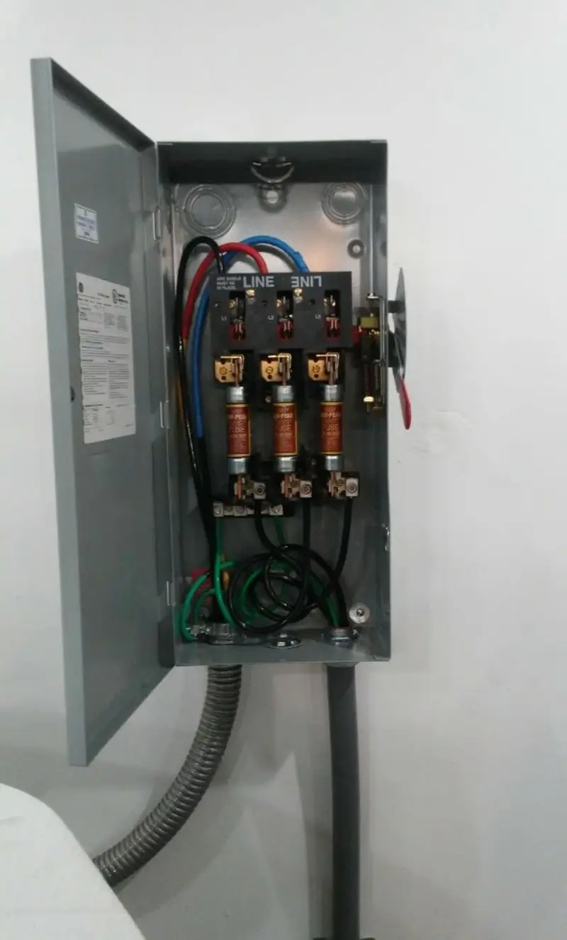 Three-phase disconnect switch installed for Smoke Detector Installation in Godley